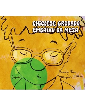 Chiclete grudado embaixo da mesa